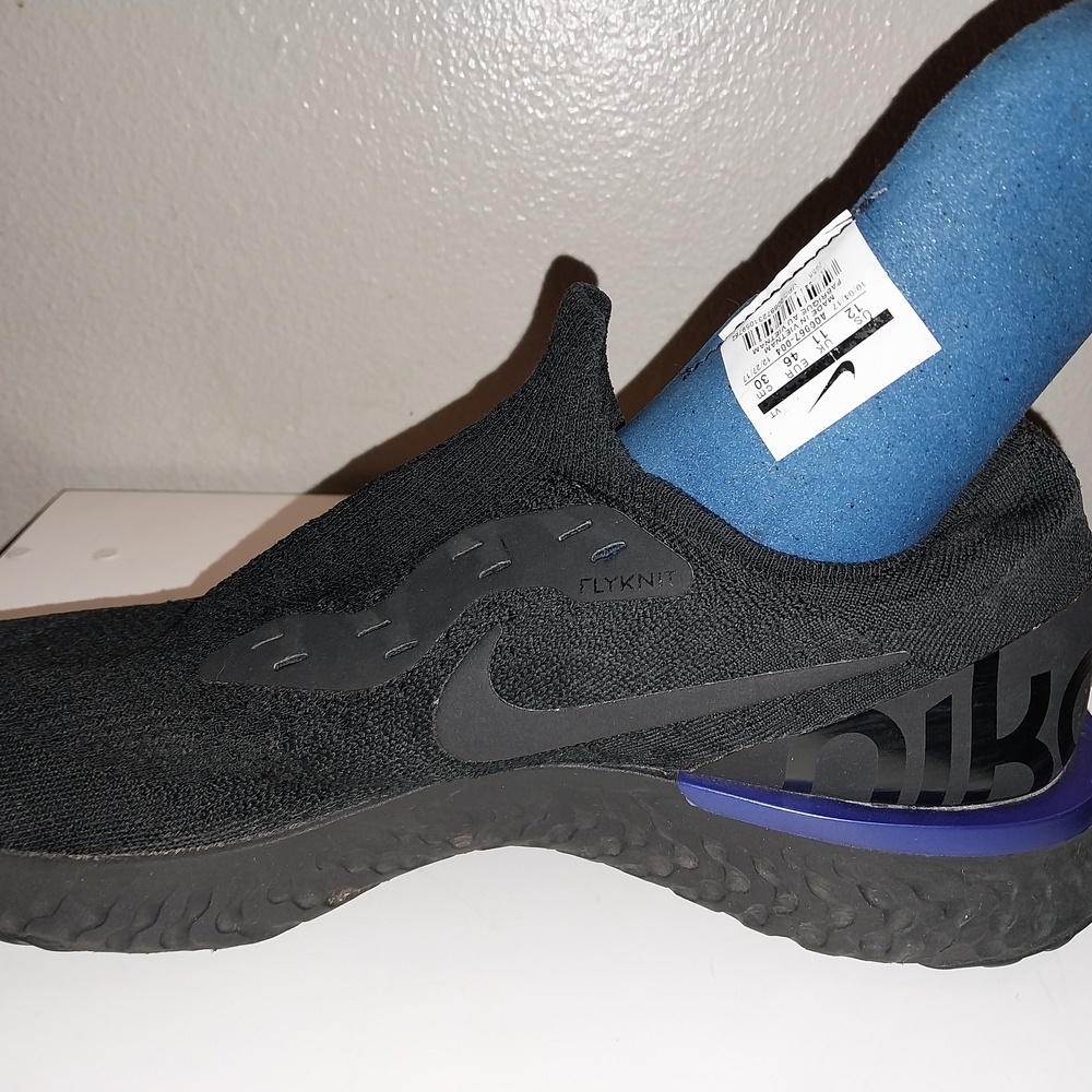 Nike Black Flyknit Sneakers with Blue Accent